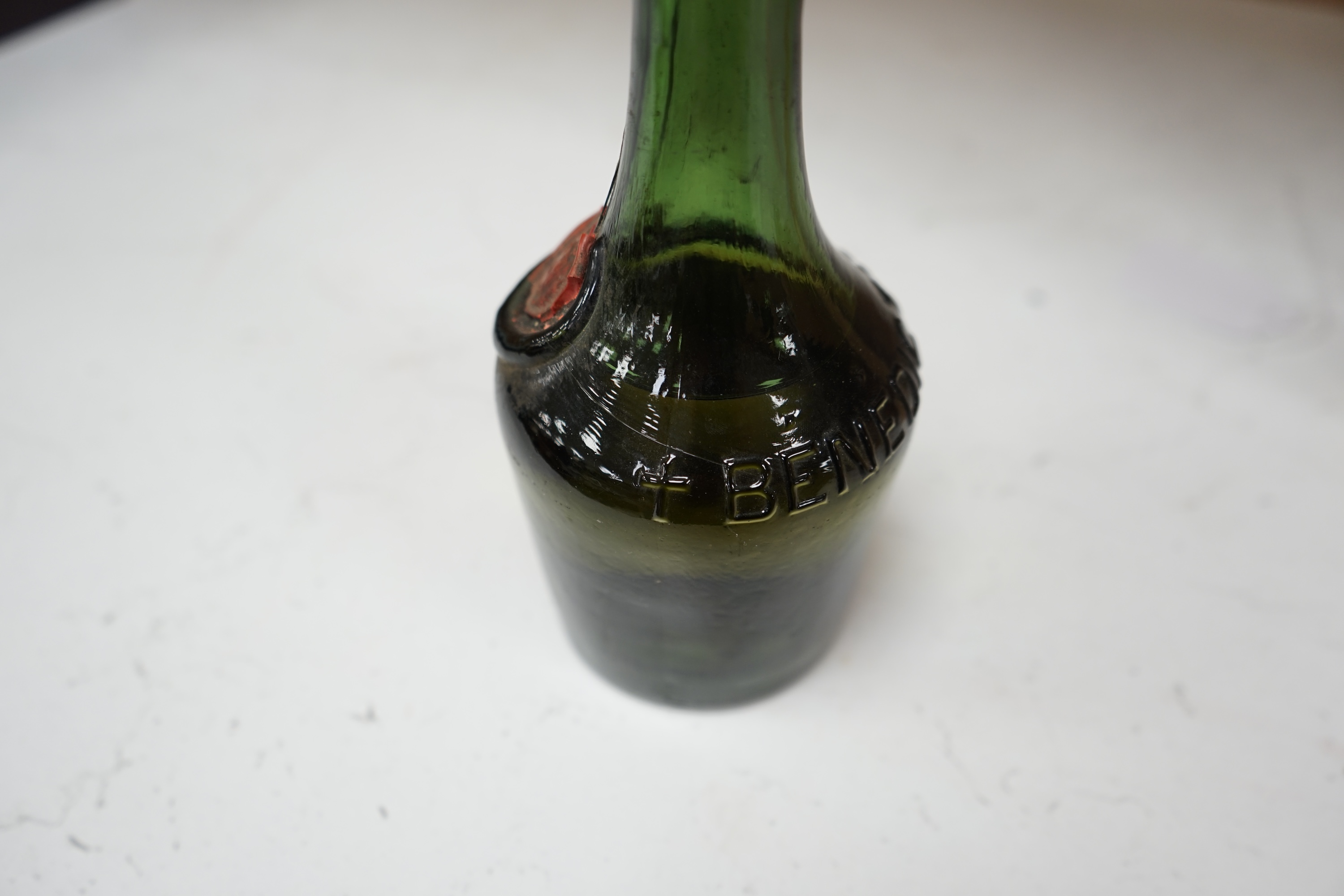 A bottle of Benedictine. Condition fair to good, label missing.